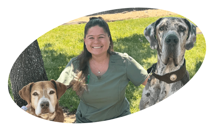 Dr. Kayla with two pet dogs